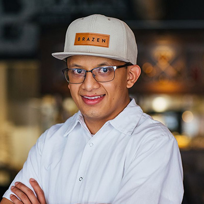 Portrait of Kevin Molina, Chef de Cuisine at Brazen Open Kitchen